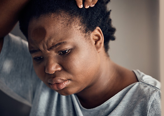 Image showing Sad, thinking and a black woman with depression in a house with anxiety or a mental health idea. Home, anxiety and an African girl or person with vision of life while frustrated from a mistake