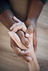 Image showing Holding hands, support closeup and help, trust with people and counseling, top view with psychology and pray together. Kindness, respect and worship, therapy and wellness with communication and care