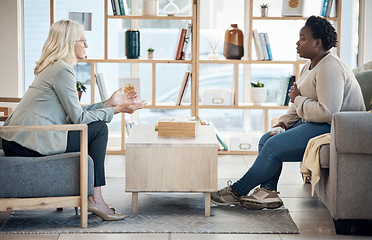 Image showing Woman, therapy patient and counseling, talking or advice for mental health, support and psychology on sofa. Professional therapist or doctor with client or people in healthcare service or consulting