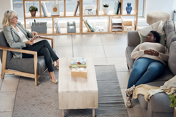 Image showing Woman, therapy patient and relax on sofa, talking or advice in mental health, support and psychology. Professional therapist or doctor with client or people for healthcare service or consulting above