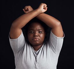 Image showing Portrait, human rights and a black woman in protest of domestic violence on a dark background. Freedom, equality or empowerment with a serious young female person in studio for gender discrimination