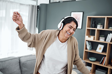 Image showing Senior, dance or happy woman streaming music or laughing to relax with freedom in home living room. Retirement, headphones or excited senior person listening to radio song or audio with joy or smile