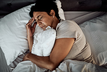 Image showing Headache, stress and senior woman in bed from above with depression, insomnia or menopause. Anxiety, migraine and top view of old lady with vertigo, trauma or mental health, problem or bedroom crisis