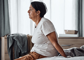 Image showing Senior woman, depression and mental health, sad with psychology and stress, thinking about life crisis with grief. Female person at home, depressed with fatigue and burnout, retirement and pain