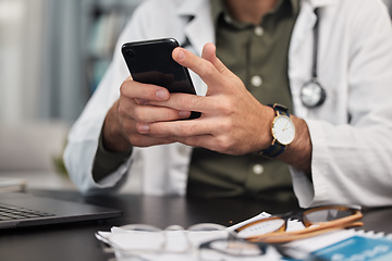 Image showing Hands, phone and doctor in office with social media, texting and web scroll. Person, mobile message and employee in clinic with online networking and telehealth consultation on company website