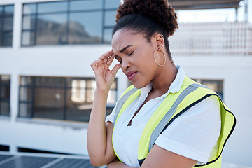 Image showing Face, sad and woman in construction with headache at renovation site, civil engineering mistake and stress. Confused, tired and frustrated african contractor with burnout, crisis and problem in city