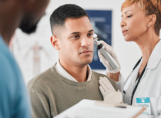 Image showing Doctor, nurse and patient, ear test and healthcare with people in hospital, check vitals and ENT specialist. Medical exam, men and woman in clinic, hearing problem with tools and health consultation