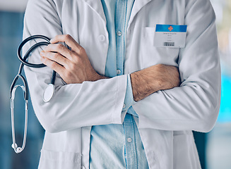 Image showing Man, doctor and hands in professional healthcare with arms crossed or stethoscope at the hospital. Closeup of male person, nurse or surgeon in confidence for medical procedure or surgery at clinic
