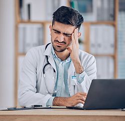 Image showing Man, doctor and headache in stress, debt or mistake from burnout, pain or deadline at the hospital. Frustrated male person or medical employee in anxiety, depression or mental health at the clinic