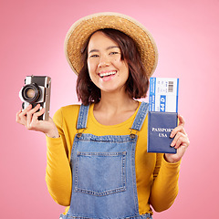 Image showing Photographer woman, passport and studio portrait for travel, memory or excited by pink background. Gen z student girl, retro camera and identity documents for compliance for international immigration