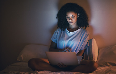 Image showing Bed, night and woman with a laptop, insomnia and connection with network, streaming movies and relax. Female person, bedroom and girl with a pc, internet film and awake with blue light or evening