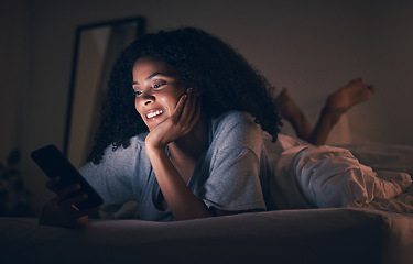 Image showing Insomnia, happy and phone with woman in bedroom for social media app, night and networking. Communication, contact and internet with female person in bed at home for mobile, online and technology