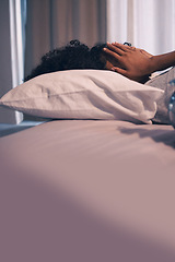 Image showing Tired, burnout and woman sleeping in bed with exhaustion, depression or insomnia at home. Rest, relax and stressed female person taking nap for mental health in the bedroom of her house or apartment.