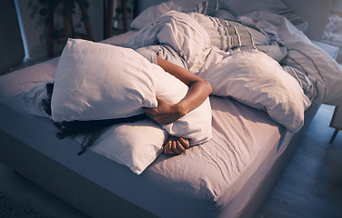 Image showing Stress, insomnia and woman with pillow on face, tired and frustrated with sleep, nightmare or dream. Fatigue, sleeping problem and exhausted girl in bed with fear, scared at night and crisis in home.