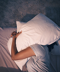 Image showing Sleep, insomnia and woman with pillow on head, tired and frustrated with stress, nightmare or dream in bedroom. Fatigue, sleeping problem and girl in bed with fear, scared at night and crisis in home