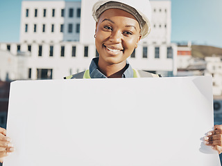 Image showing Happy black woman, architect and billboard in city for construction plan, advertising or sale outdoors. Portrait of African female person, engineer or contractor holding sign, paper or board in town