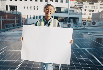 Image showing Happy black woman, architect and billboard on roof for solar panel installation, plan or advertising. Portrait of African female person, engineer or contractor holding sign, paper or board in city