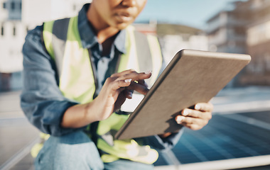 Image showing Woman, architect and hands with tablet in city for solar panel inspection or installation. Closeup of female person, engineer or contractor working on technology for alternative energy on the roof