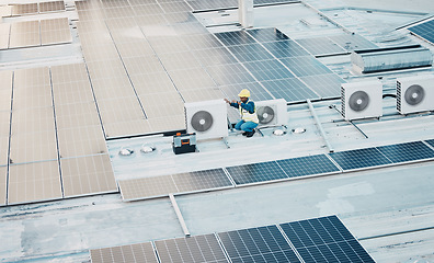 Image showing Technician, roof and solar panel for clean power, sustainability and maintenance for renewable energy. Engineer, photovoltaic technology and inspection on rooftop, building or electricity development