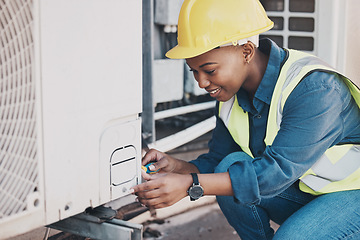 Image showing Happy black woman, technician and building installation for air control, construction or vent on roof. African female person, contractor or engineer installing industrial equipment for architecture