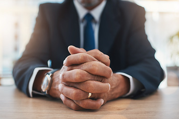 Image showing Hands, authority and lawyer man waiting while sitting at a table in court during a case or trial closeup. Justice, law and legal with a male advocate in a courtroom for representation or legislation