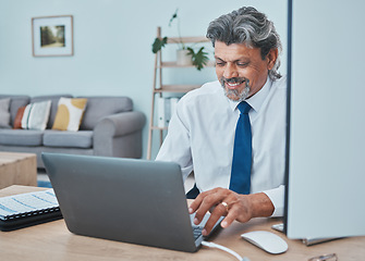 Image showing Business man, laptop and work from home, online or finance management and typing report in living room. Computer, research and happy professional person, executive or entrepreneur in financial career