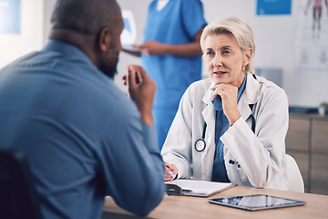 Image showing Woman, doctor and talking to patient in consultation for healthcare advice, clinic services and support. Mature medical professional consulting man in hospital for analysis, feedback and test results