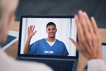Image showing Man, doctor and laptop for video call, virtual meeting or online consultation at the hospital. Male person, medical or healthcare professional waving hello on computer for consulting or Telehealth