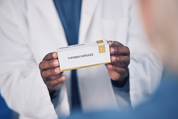 Image showing Doctor, hands and box of medication for patient, healthcare or consultation at the pharmacy or clinic. Closeup of male person or medical professional consulting customer with pills or pharmaceuticals