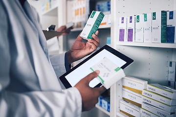 Image showing Pharmacist, tablet and hands for inventory inspection, box or medication on shelf at the pharmacy. Man, medical or healthcare professional checking stock, pills or medicine for storage at drugstore