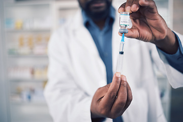 Image showing Hands, doctor and vaccine, injection and bottle with medicine, healthcare and safety from virus zoom. Person in pharmacy with drugs, liquid and syringe with glass container, pharmaceutical and health