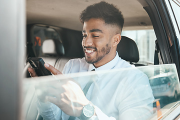 Image showing Business man, car and typing with phone for digital communication, mobile networking and chat. Happy indian corporate worker texting contact on smartphone, reading notification or travel in transport