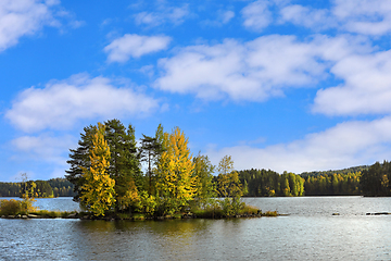 Image showing Small Autumnal Island Under Beautiful Sky