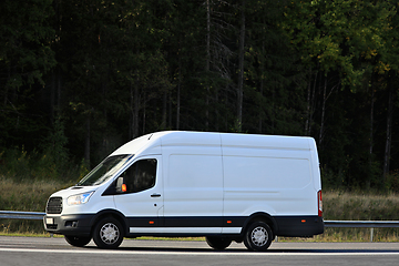 Image showing White Delivery Van at Speed on Highway