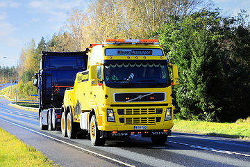 Image showing Yellow Volvo FH Heavy Duty Recovery Vehicle Tows Semi Truck