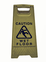 Image showing Vintage looking Caution wet floor