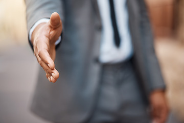 Image showing Closeup, business man and offer handshake for introduction, meeting and hello for networking in city. Worker stretching for shaking hands, welcome and thank you for HR recruitment, promotion and deal