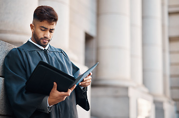 Image showing Lawyer man, street and reading documents for case, court battle by city building with information for criminal defence. Young attorney, paperwork and study for litigation, evidence and justice system