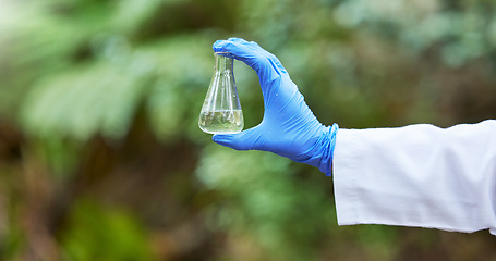 Image showing Environment, science and flask with hands of scientist in nature for quality control, research and water. Sustainability, study and medical with closeup of person in forest for eco biotechnology