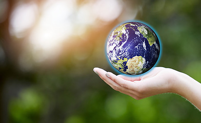 Image showing Woman, hands and palm with planet earth for eco friendly environment, global warming or nature. Closeup of female person with hologram of world for sustainability, living or natural globalization