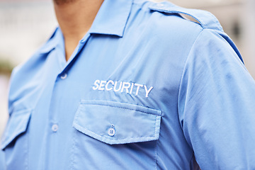 Image showing Closeup of security guard, police officer and blue shirt for crime watch, surveillance and legal safety. Person, uniform and service of cop, law enforcement worker and bodyguard on patrol for justice