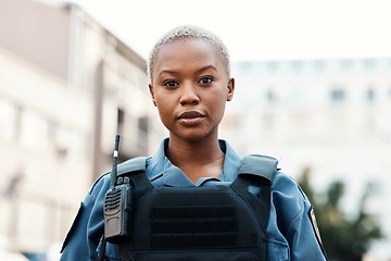 Image showing Portrait, police or black woman in city for law enforcement, community protection or legal street safety. Cop, supervisor or serious female security guard on patrol in urban town for crime or justice