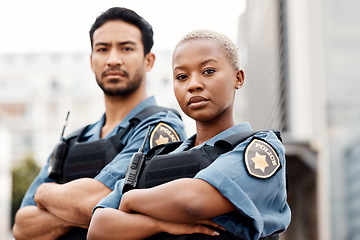 Image showing Police, team and arms crossed in confidence for city protection, law enforcement or crime. Portrait of confident man and woman officer standing ready for justice, security or teamwork in urban town