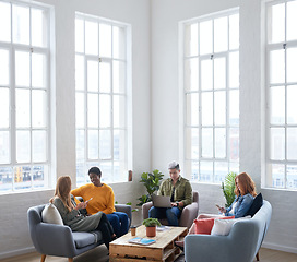 Image showing Creative, meeting and team in the office lounge or coworking space planning a project in collaboration. Teamwork, diversity and business people working together with technology on a sofa in workplace