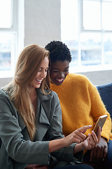 Image showing Happy, social media and women with a phone on a work sofa for communication, notification or a chat. Smile, digital and diversity with friends reading from a mobile app, contact or email together