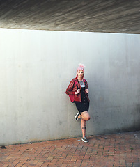 Image showing Education, thinking and student with a woman punk leaning against a gray wall on the campus of her university. Gen z, idea and scholarship with a young female pupil standing at college for learning