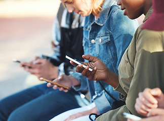 Image showing Friends, smartphone and students outdoor, college and social media, reading chat online and connectivity. Young people at campus, using phone and check mobile app, technology and communication