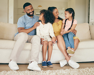 Image showing Parents, kids and relax on sofa of home for love, care and happy quality time together in living room. Mother, father and young children smile in support, trust and freedom of bonding in family house