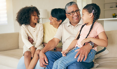 Image showing Grandparents, children and smile on sofa in home for love, care and quality time together. Grandmother, grandfather and happy young kids relax on couch for bond, support and fun in family living room