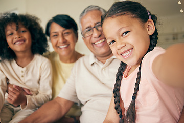 Image showing Portrait of grandparents, happy children and selfie in home, bonding together and love. Face, profile picture and kids with grandmother and grandfather taking photo for family memory on social media